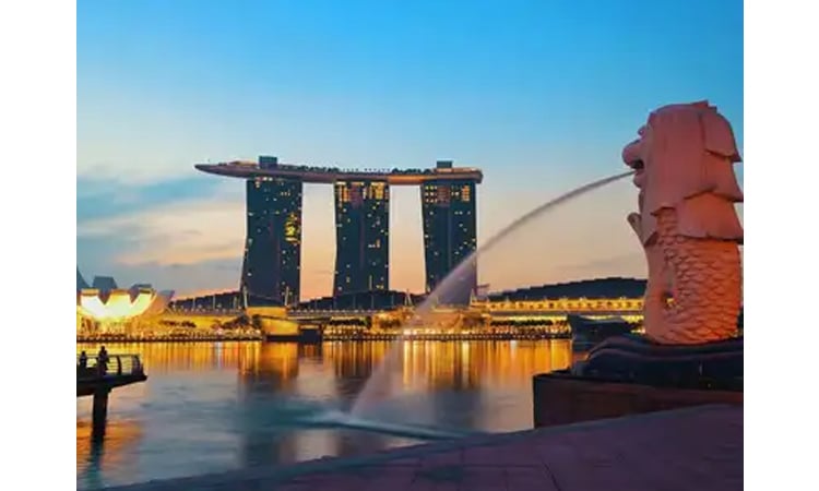 Singapore economy beats Q1 forecasts, warns of trade war risks