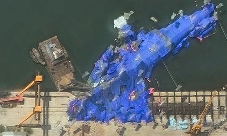 N. Korea detains three over warship launch accident: KCNA
