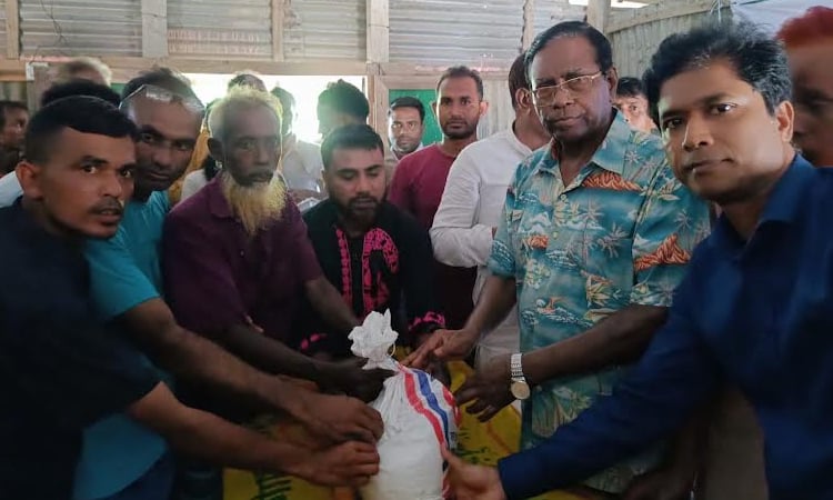 Food items distributed among storm hit people in Jamalpur 