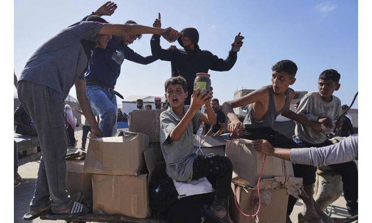Gaza rescuers say Israeli gunfire kills 10, wounds over 100 near aid