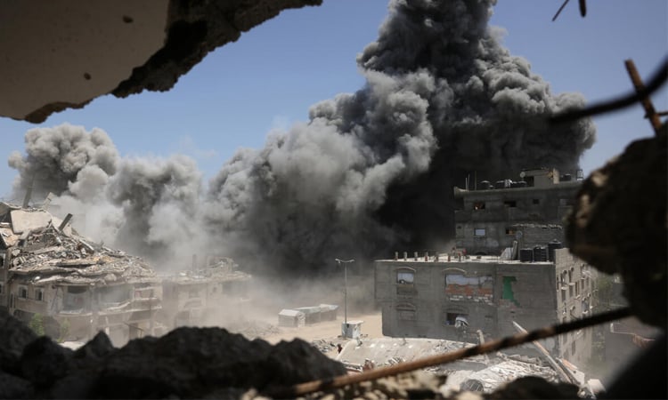 Rescuers say Israeli fire kills at least 15 near Gaza aid point