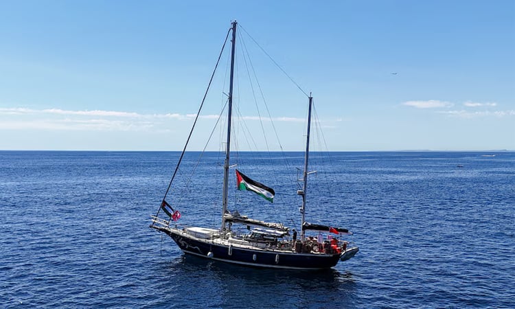 Aid group says Israeli forces boarded Gaza-bound boat