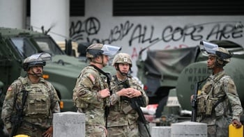Nighttime curfew in LA as Trump vows to 'liberate' city