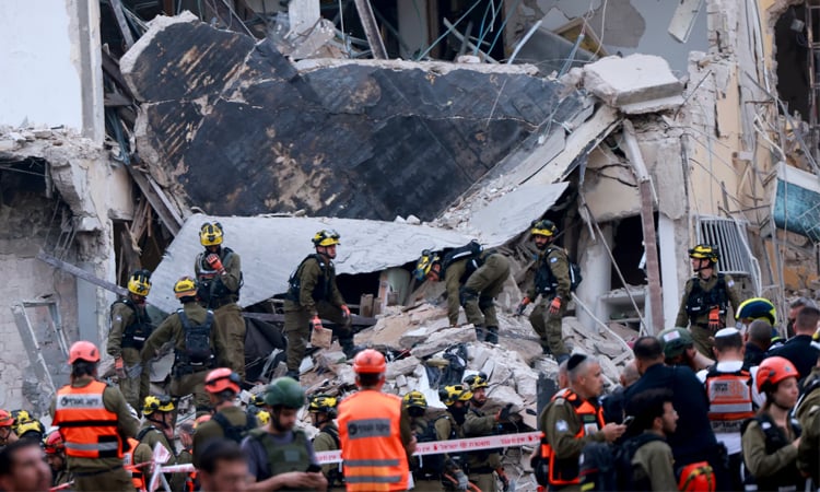 Israeli rescuers say latest Iran strikes kill five, wound 92