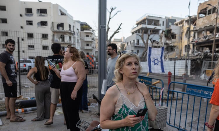 Israel, Iran trade missile fire as Trump warns Tehran to 'evacuate'