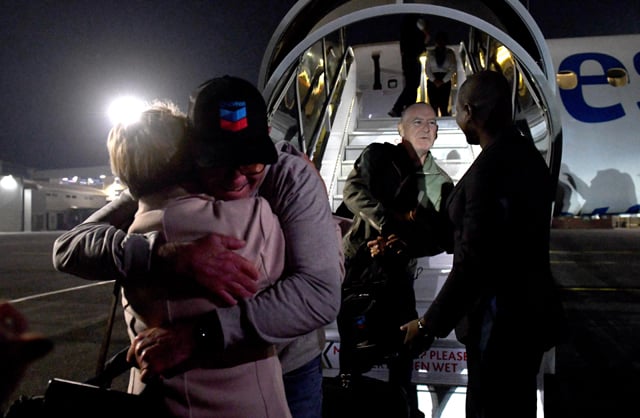 Two South Africans jailed in Eq. Guinea return home after pardon