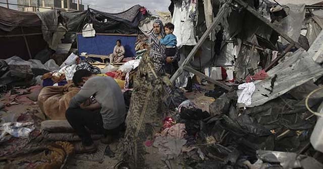 Spain PM alleges 'genocide' in Gaza as rescuers say 65 killed