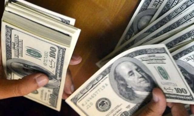 Dollar slides as Trump eyes new Fed boss