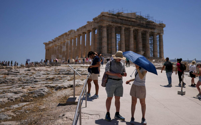 Europe bakes in summer's first heatwave as continent warms