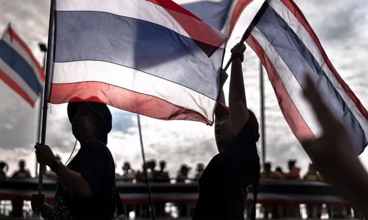 Thailand's ruling political dynasty faces day of legal peril