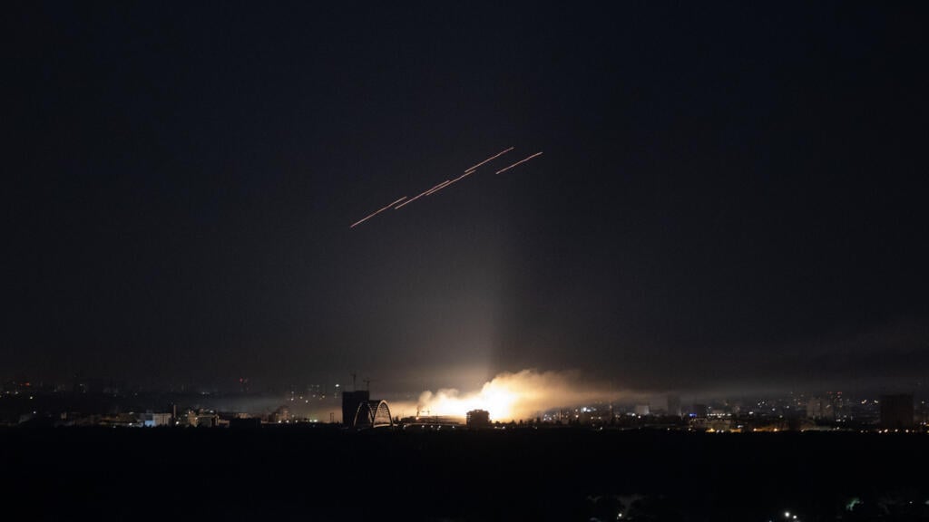 Wave of Russian drones, missiles kills two in Kyiv