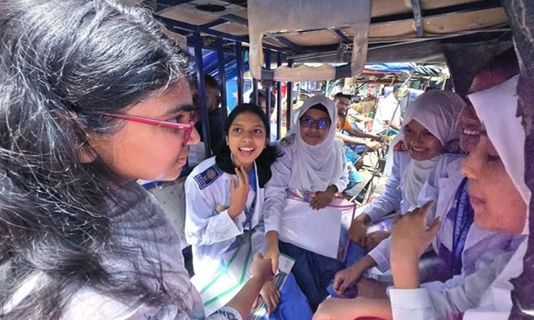 NCP senior joint member-secretary Dr Tasnim Jara with schoolgirls on the streets in Nilphamari town on july 3, 2025