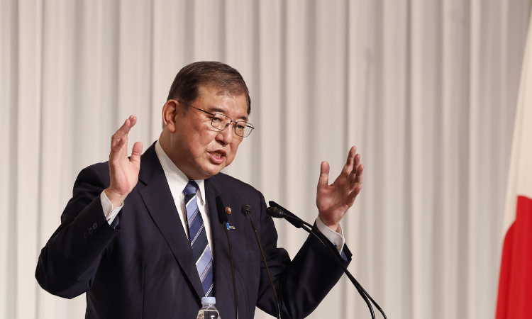 Polls suggest tough election for Japan PM