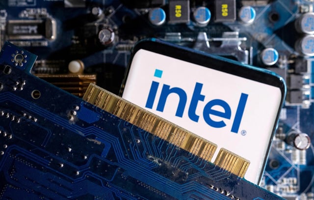 US chip maker Intel says revenue rose as it cut ranks