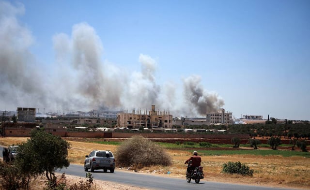Syria arms depot blasts kill 12, wounds more than 100: monitor