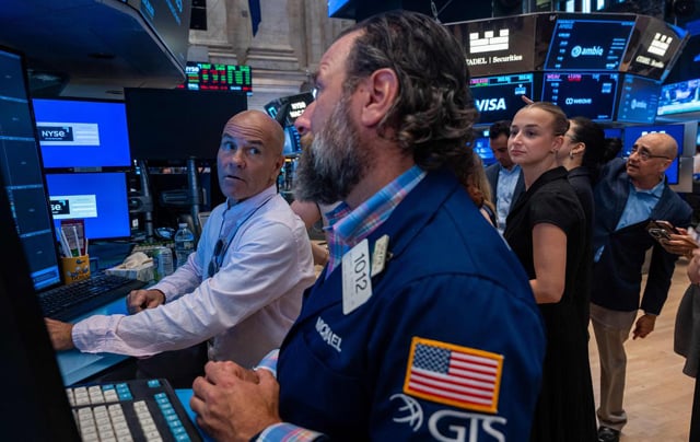 US stocks end lower after strong start as rally fades