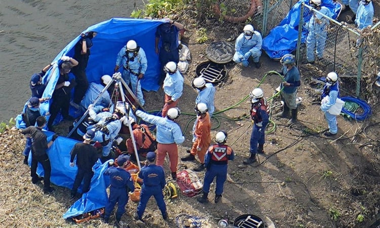 Four workers dead in Japan after manhole fall