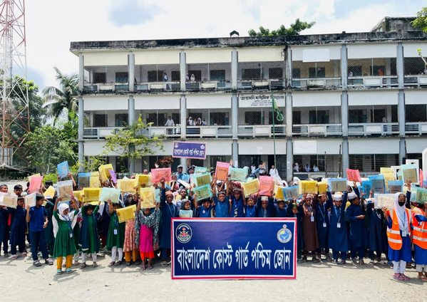 Coast guard distributes educational materials among students in Mongla