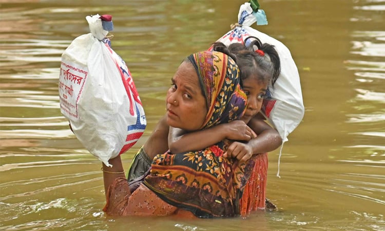 Govt distributes 335,443 tonnes of rice among poor, disaster-hit people
