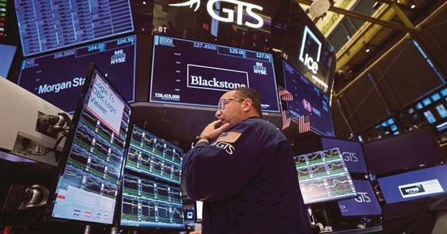 Nasdaq ends at record, Dow falls as tariff hikes take effect