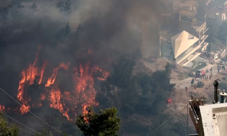 Firefighters battle blaze near Athens for second day