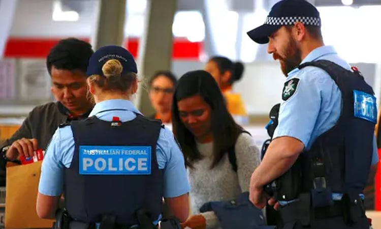 Man arrested after police gun fired at Australian airport