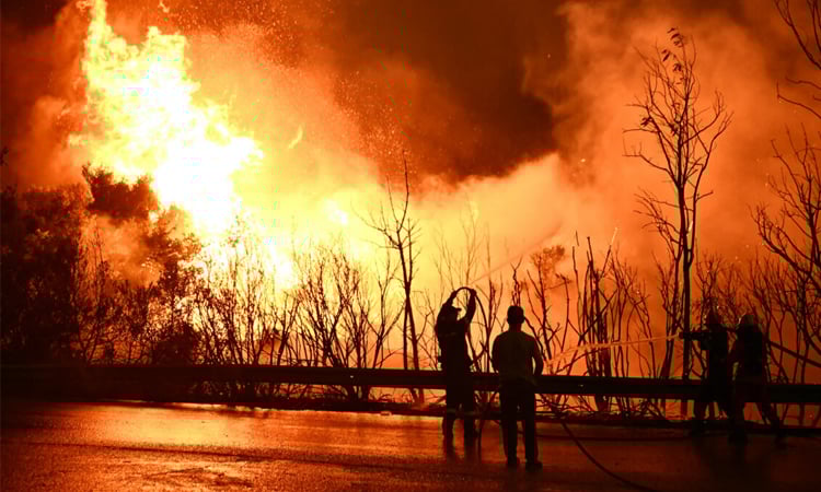 Thousands battle Greece fires as heatwave bakes Europe