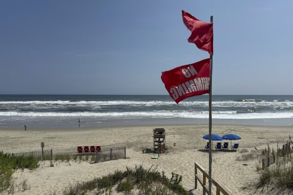 North Carolina coasts prepare for flooding as Erin churns offshore