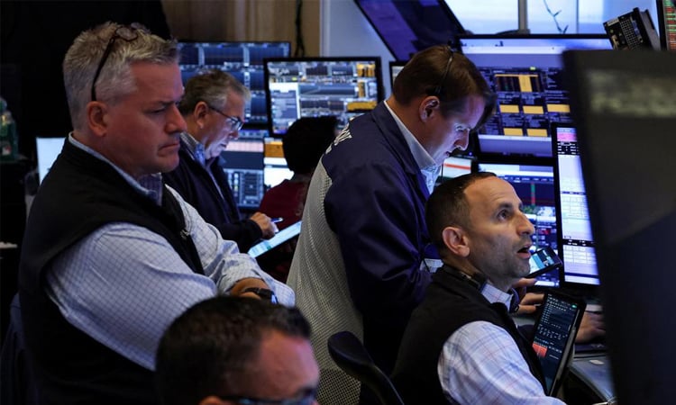 Wall Street mostly down as tech still under pressure