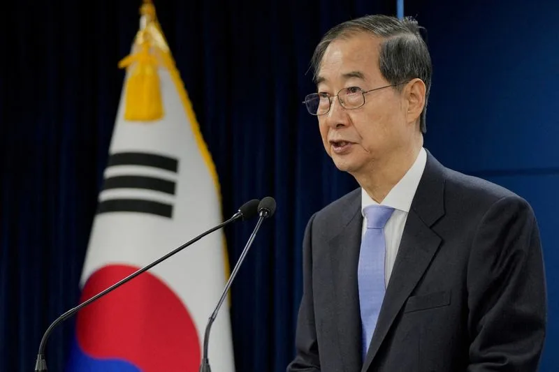 S. Korea prosecutors seek arrest of ex-PM Han over martial law
