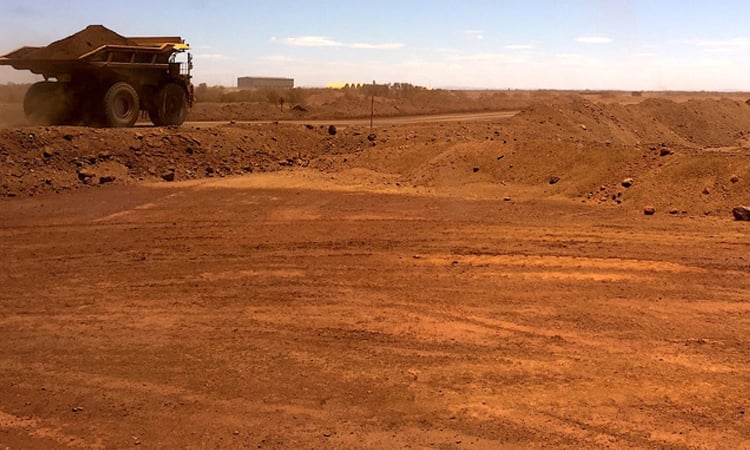 Australian iron ore giant Fortescue reports profit plunge