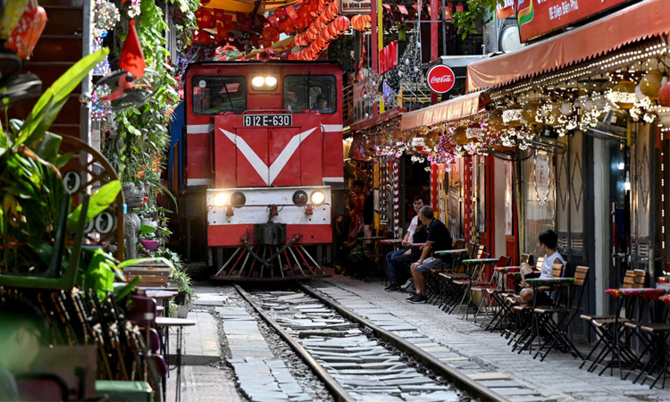 Tourists dice with danger on Hanoi's train street