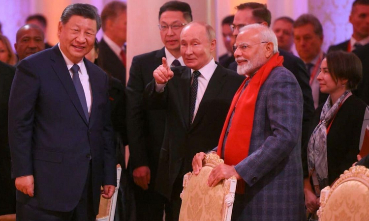 Putin and Modi in China for summit hosted by Xi