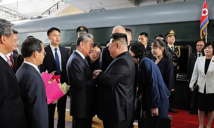 Daughter of N. Korea's Kim makes global 'debut' on China trip
