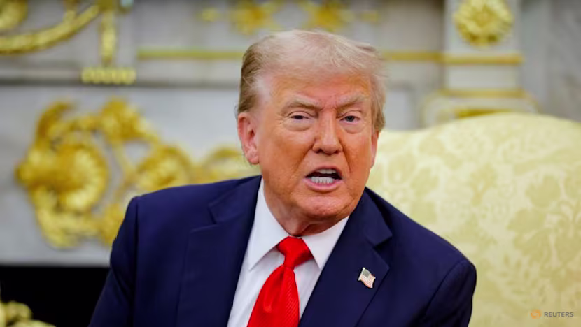 Trump signs order to lower US tariffs on Japan autos to 15%