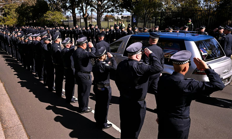 Australia offers reward for arrest of gunman after police killings