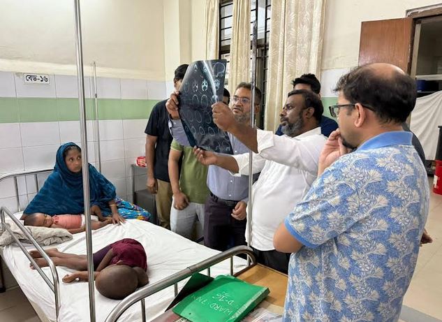Tarique Rahman stands beside child Rana | Others