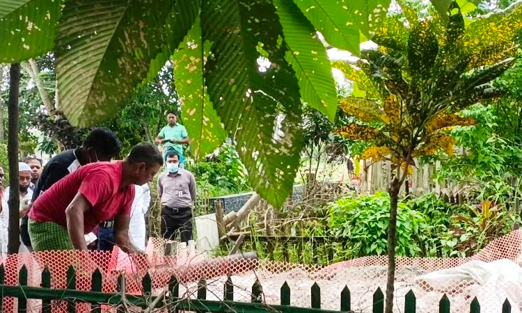 Body exhumed from grave after 47 days of burial in Madaripur