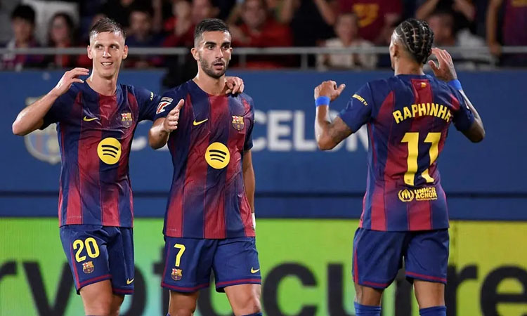 Torres double helps Barca down listless Getafe