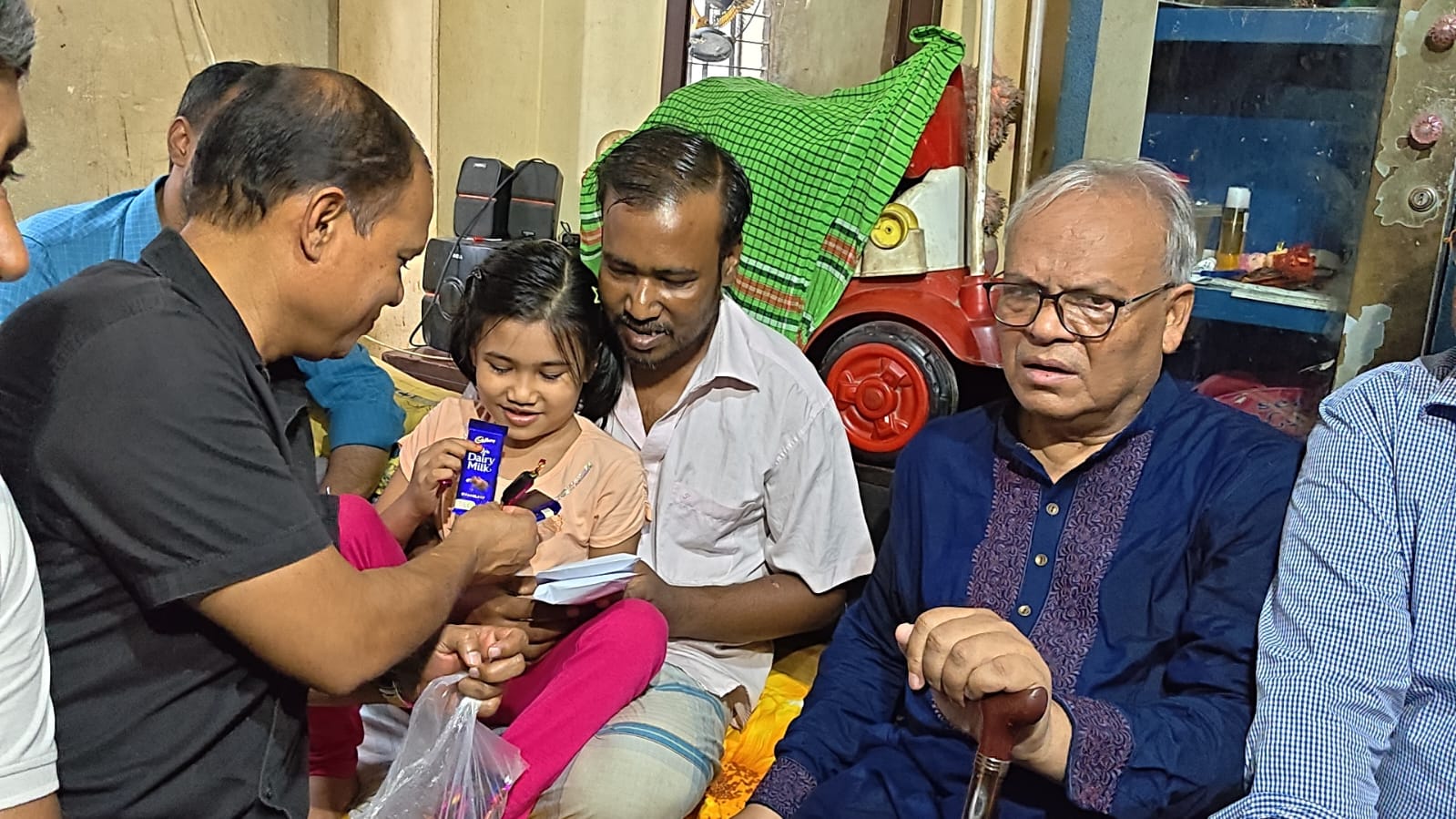 Tarique Rahman provides assistance to baby Lamia's father Abdur Razzak