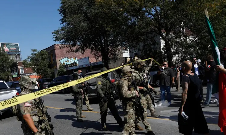US agent shoots Chicago motorist as judge blocks troops to Portland