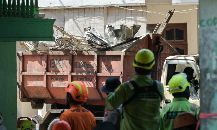 Death toll from Indonesia school collapse rises to 63
