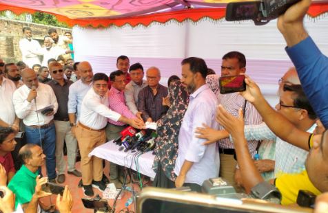 Tarique Rahman stands by elderly couple pulling ghani without cows