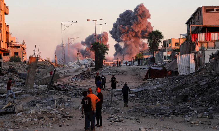 Israel begins Gaza pullback as thousands head home