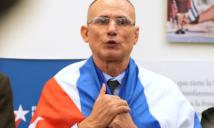 Cuban dissident Ferrer begins US exile but vows to keep fighting