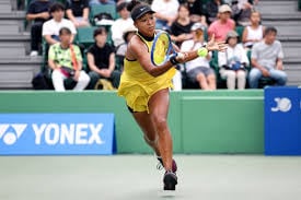 Tearful Osaka battles injury to reach Japan quarter-finals