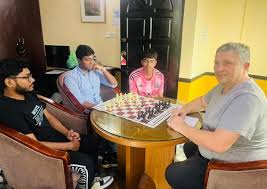 Young chess players shine against Russian GM 