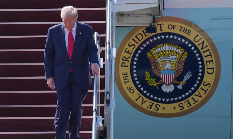 Troops, trade and 'hot' trucks: Trump descends on Japan