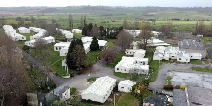 UK 'squandered' billions on flawed asylum housing system: report