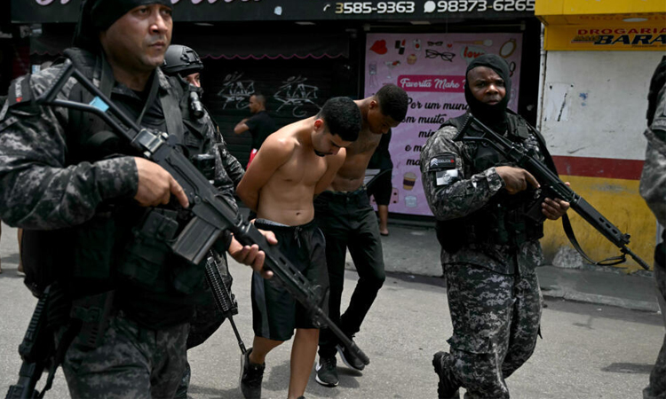 At least 64 killed in war-like Rio drug raids
